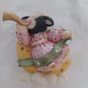 Enesco Mary Moo Figurine titled "Oh Night Bovine".  Banner is dated 2002.  Used